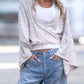 Tied Sequin Surplice Flare Sleeve Blouse