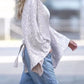 Tied Sequin Surplice Flare Sleeve Blouse