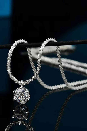 Modern Elegance: Sterling Silver Platinum-Plated Moissanite Necklace with Zircon Accents - 1 Carat Main Stone